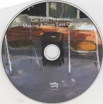 CD Car Seat Headrest: Making A Door Less Open 108095