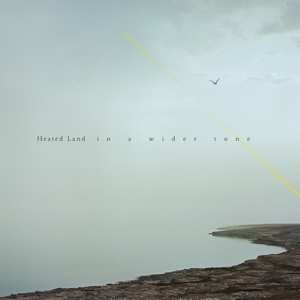 Album Heated Land: In A Wider Tone