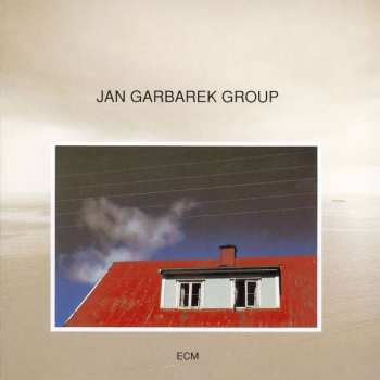 Jan Garbarek Group: Photo With Blue Sky, White Cloud, Wires, Windows And A Red Roof