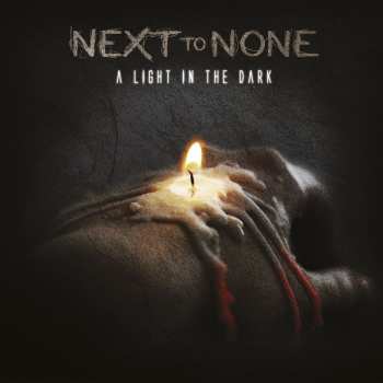 Album Next To None: A Light In The Dark
