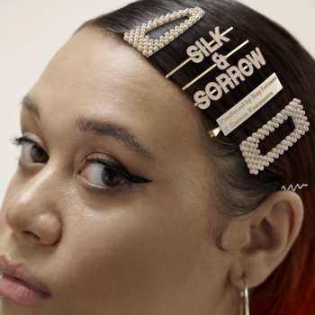 Album Ray Lozano: Silk & Sorrow