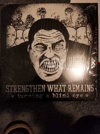 Album Strengthen What Remains: Turning A Blind Eye
