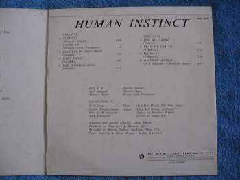 LP The Human Instinct: Pins In It